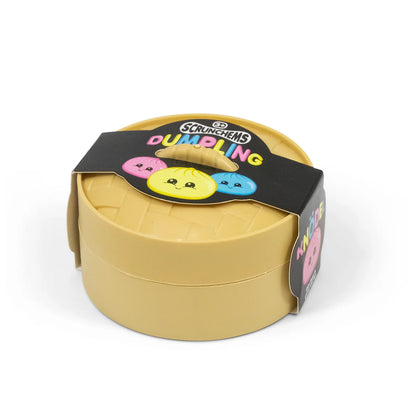 Scrunchems Dumpling Squishy Squeezy Stretchy Toy in Pink, Blue or Yellow